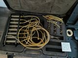 a case with a bunch of wires in it on a table