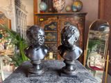 pair of antique bronze busts of children on marble pedestal
