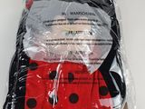 the ladybug socks are wrapped in plastic and ready to be worn