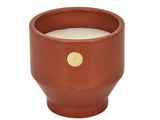 bougie dans un pot en terre cuite dont le couvercle est orné d'un bouton doré
