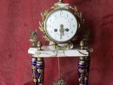 a clock that is sitting on top of a table