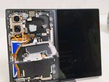 a picture of a cell phone with a broken screen