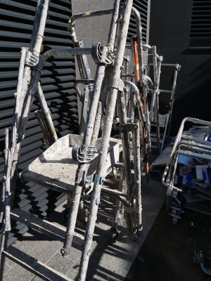 a chair made out of old skis and ski poles