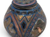 an image of a decorative vase with a lid