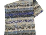 an image of a scarf with a blue and grey pattern on it