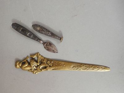 three different types of tools on a white surface