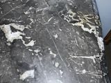 a black and white marble counter top in a bathroom