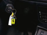 steering wheel of a car with a keychain attached to it