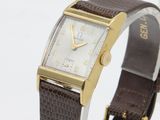 a watch that is sitting on top of a table