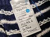 a label on a sweater that says polo ralph