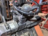 a close up of the steering of a forklift