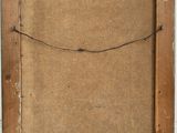 an old wooden frame with a rope hanging from it ' s side