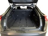 the back of a car with its trunk open showing the cargo compartment