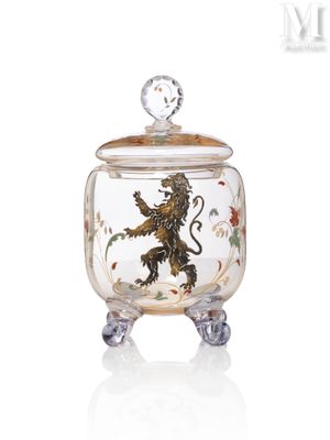 a glass jar with a lion inside of it