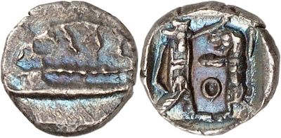 a silver coin with a picture of a man on it