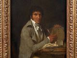 portrait of a man writing a letter by person
