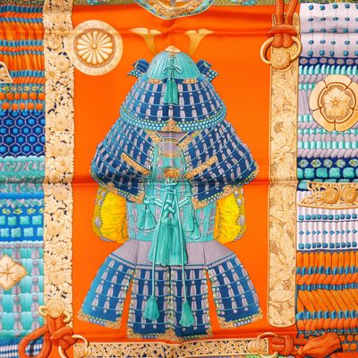 a picture of a picture of a man in a blue and orange outfit