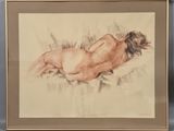 an image of a nude woman laying down on her stomach