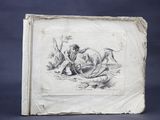 un vieux livre sur lequel figure le dessin d'un homme et d'un chien