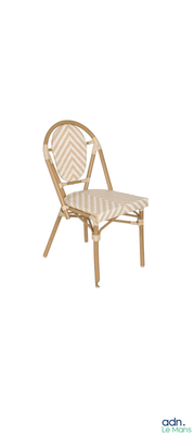 a wicker chair that is sitting on a white background