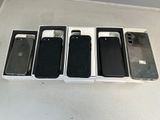 six iphones are in a box on a table