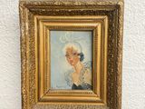 painting of a woman in a white hat on a wooden easel
