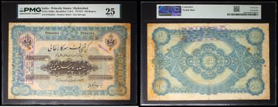 three different types of currency are displayed in a display case