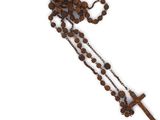 wooden rosary with a cross on a chain on a white background