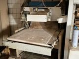 a machine that is sitting inside of a building