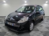 a picture of a small black car parked in a garage