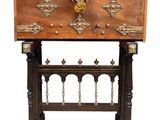 an old wooden chest on a stand with a lock on it