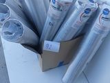 many rolls of duct tape in a box on the ground
