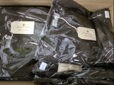 three bags of marijuana sitting inside of a cardboard box