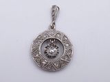 an image of a diamond pendant on a white background