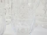 a lot of empty wine glasses sitting on a table