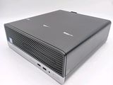 an image of a black computer sitting on top of a white surface