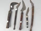 four different types of knives are lined up next to each other