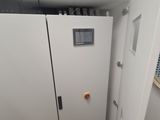 a man that is standing in front of a refrigerator