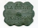 une plaque en pierre sur laquelle est inscrit « la pierre poisson »