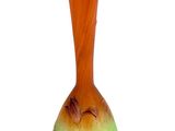 a glass vase that has a green and orange design on it