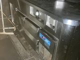 an image of a kitchen with a sink and a stove