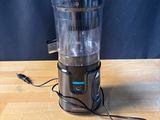 a blender that is sitting on a wooden table