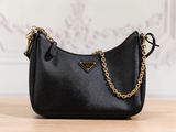 a black purse sitting on top of a wooden table