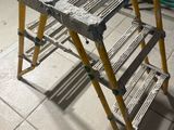 a picture of a ladder that is sitting on the floor