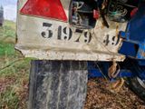 a close up of a sign on the back of a truck