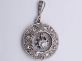 an image of a diamond pendant on a white background
