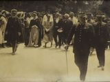 a black and white photo of a crowd of people