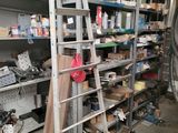a ladder leaning up against a wall in a garage