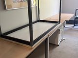 a desk with a mirror on top of it in a room