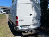 a white van parked on the side of the road
